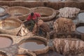 FEZ, MOROCCO Ã¢â¬â FEBRUARY 20, 2017 : Men working at the famous Chouara Tannery in the medina of Fez, Morocco Royalty Free Stock Photo